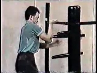 wing chun by master chan. form 108 movements on a wooden mannequin